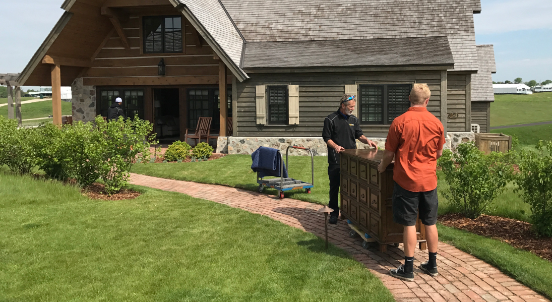 Workers moving into home