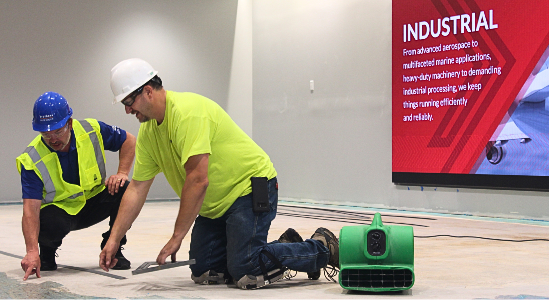 Workers installing a floor